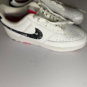 White and Black Sneakers with Pink Accents